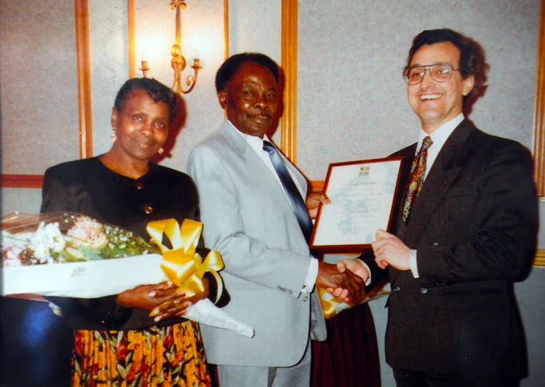 Percival Hanniford being awarded a long service certificate after 30 years with British Rail, with Hermine. Image courtesy of Celia Enyioko-Hanniford