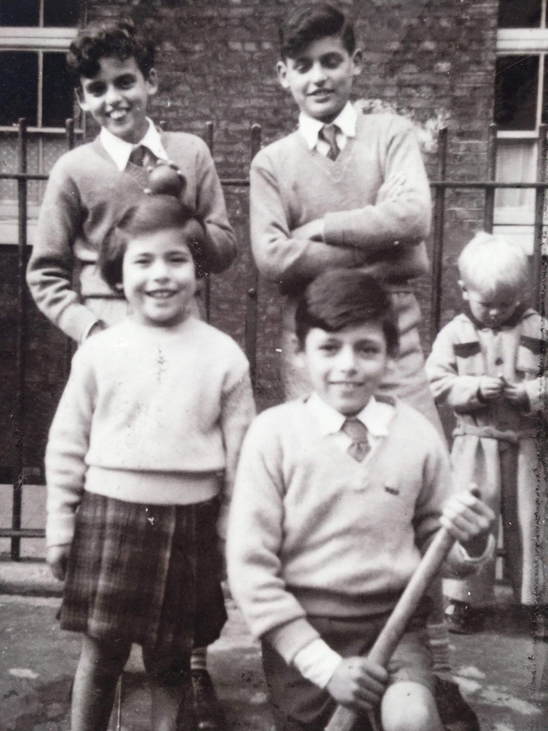 Sheereen Khan with her three brothers. Courtesy of Sheereen Khan