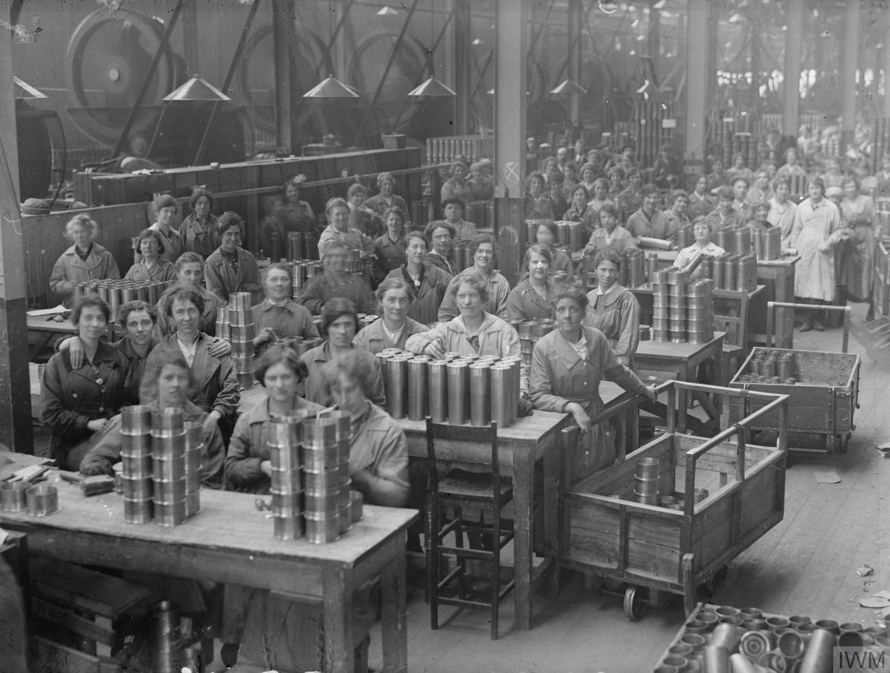 THE ARMS PRODUCTION IN BRITAIN IN THE FIRST WORLD WAR (Q 27849) Women war workers arrange shell cases in the new case shop at the Royal Arsenal, Woolwich. Copyright: © IWM. Original Source: http://www.iwm.org.uk/collections/item/object/205196358