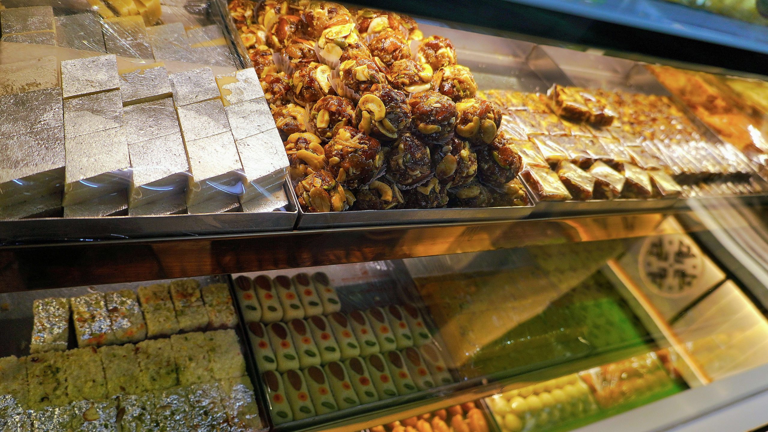 A selection of Indian sweets. Photo by Bonala Yellender on Unsplash.