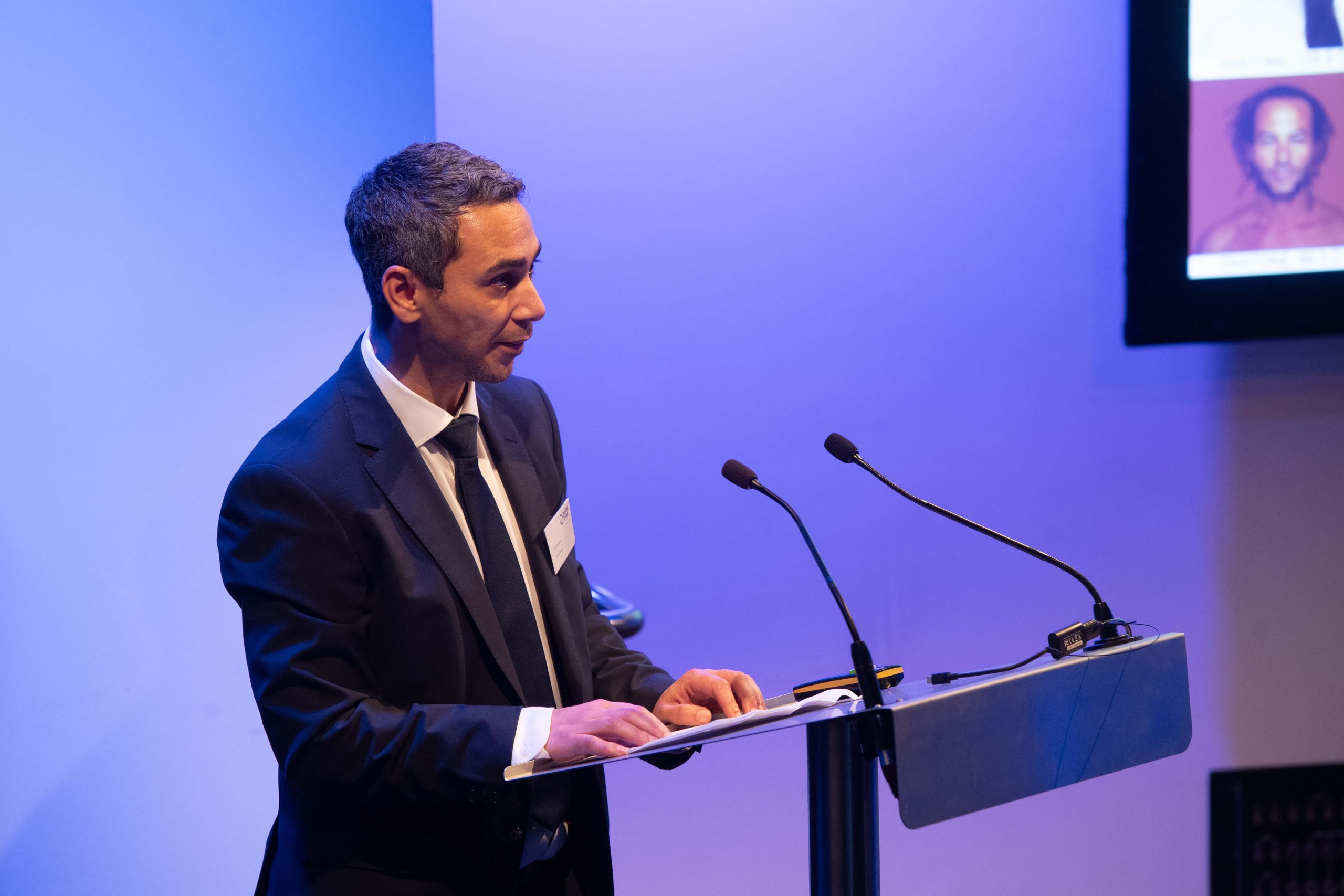 Carl Hanser delivering the opening speech at the launch of The Portal Trust's report, November 2025. Image courtesy of The Portal Trust © The Portal Trust